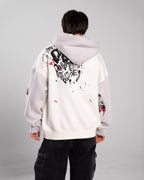 Rückansicht des Hoodies mit auffälligem schwarz-rotem Rückendruck. Der Print zeigt Kritzelgrafiken, Gesichter und den handschriftlich wirkenden Schriftzug „DON’T OBEY“ mehrfach wiederholt. Auf dem Ärmel sind rote und schwarze Linienzeichnungen sichtbar.